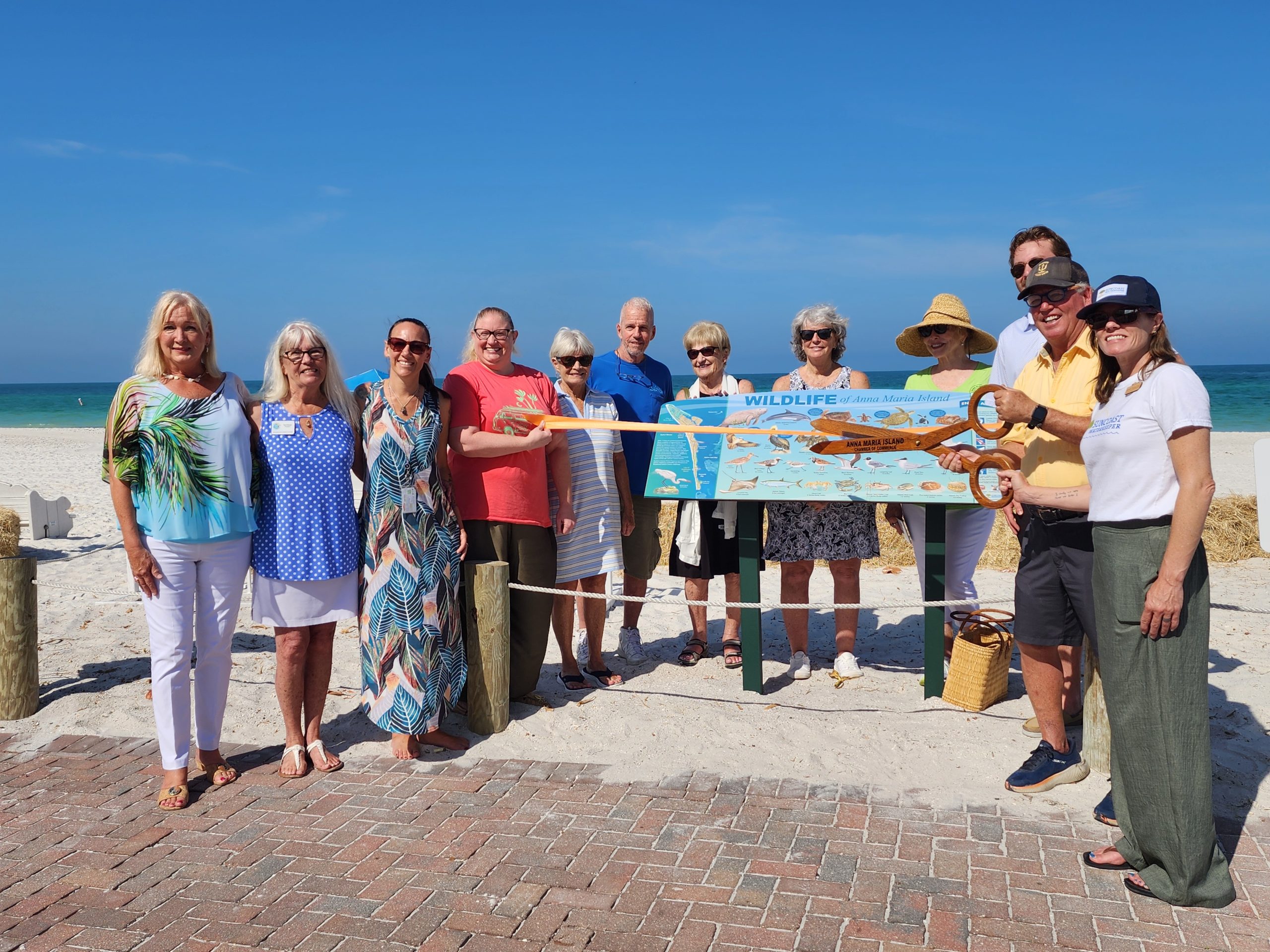 ribbon-cutting wildlife sign